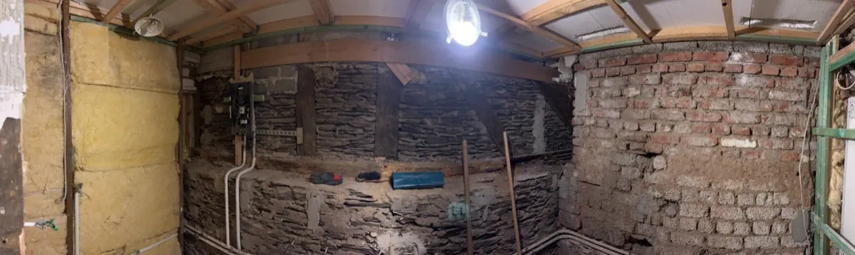 Bathroom before renovation – raw rubble-stone vault